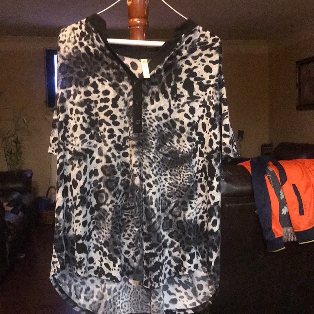Animal print half button up blouse